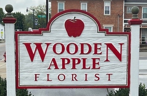 The Wooden Apple Sign